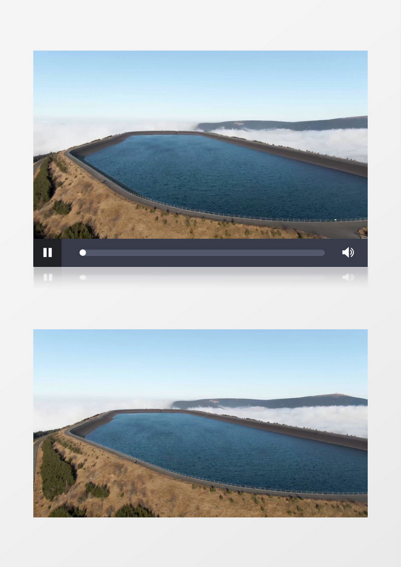 航拍山顶的湖泊和环湖公路实拍视频素材