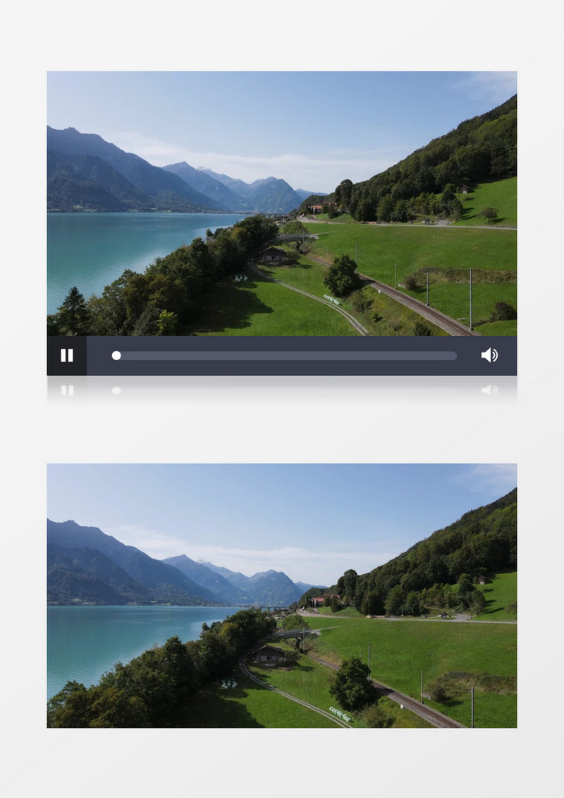 航拍山脚下的湖泊和湖边的小村落实拍视频素材