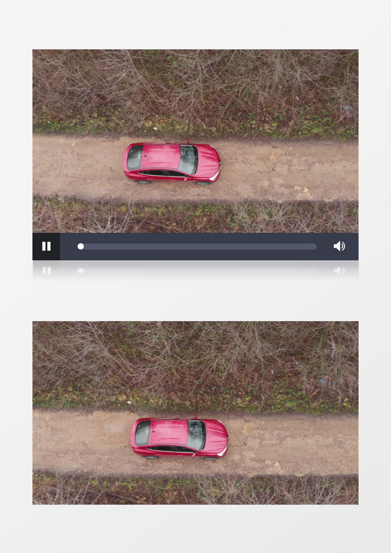 一辆红色的汽车行驶在郊外的小路上实拍视频素材