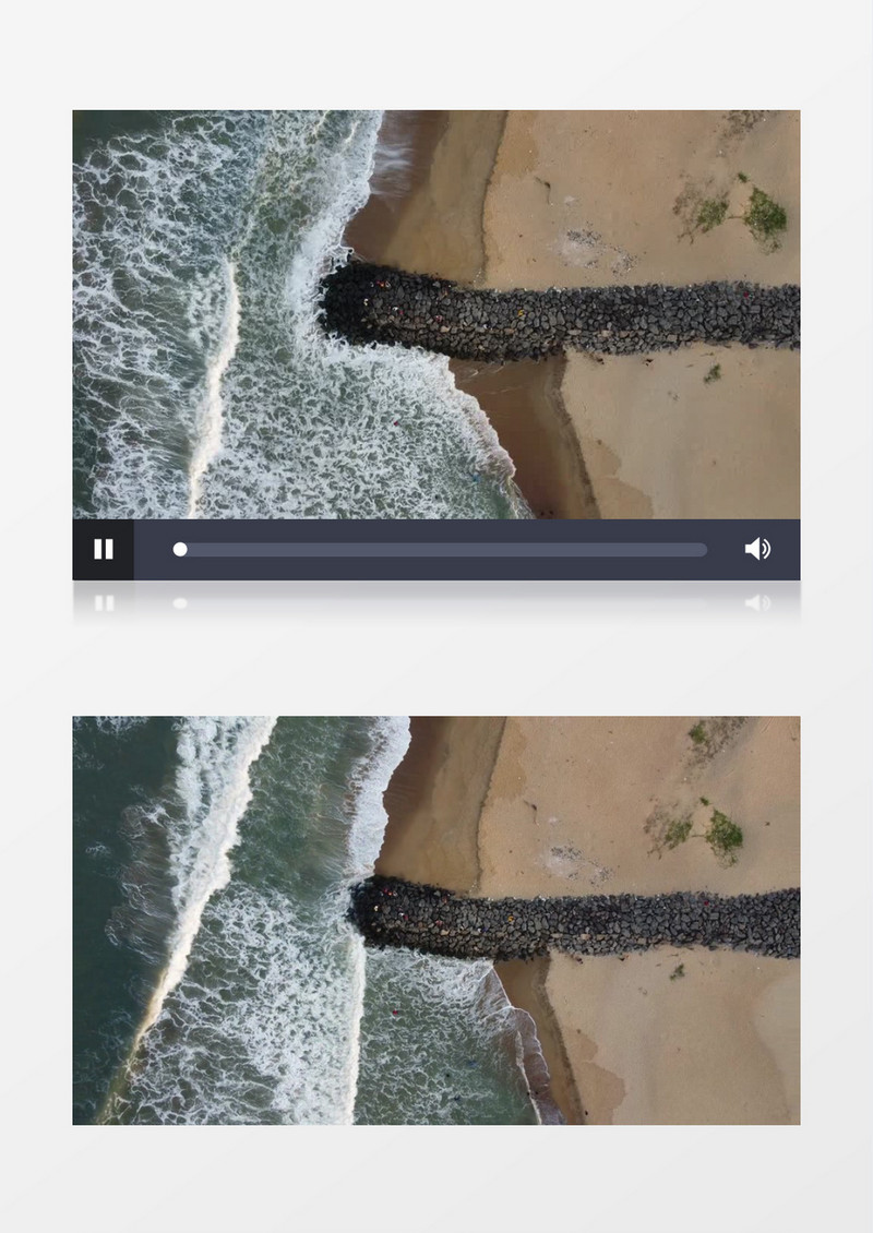 海水不断冲刷着海边的石头和沙滩实拍视频素材