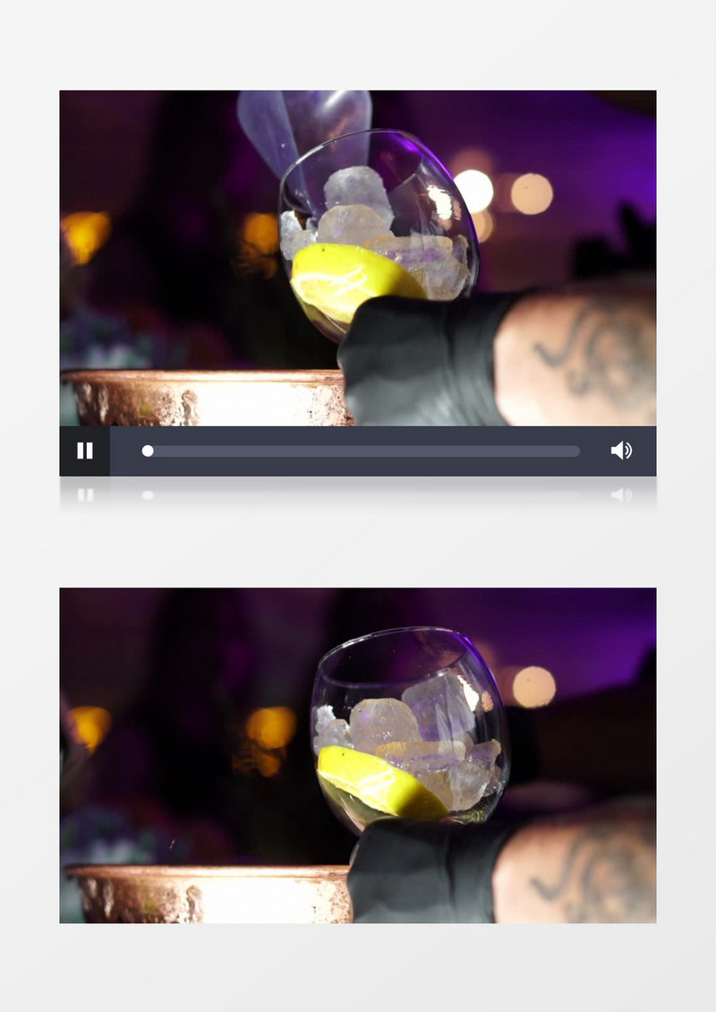 调酒师在酒杯中加入柠檬片和冰块实拍视频素材