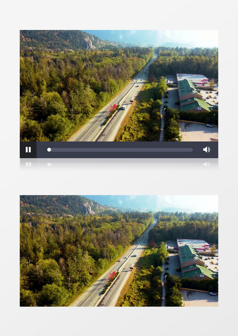 山脚下的公路上行驶的车流实拍视频素材