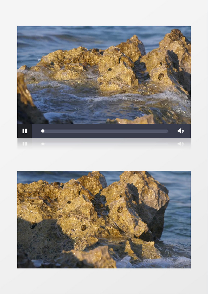 海边不断被海水冲刷着的礁石实拍视频素材