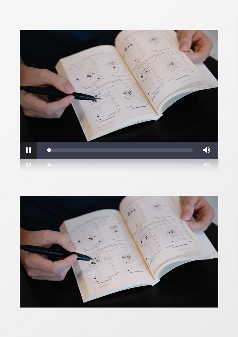 人拿着钢笔准备在书中做标记实拍视频素材