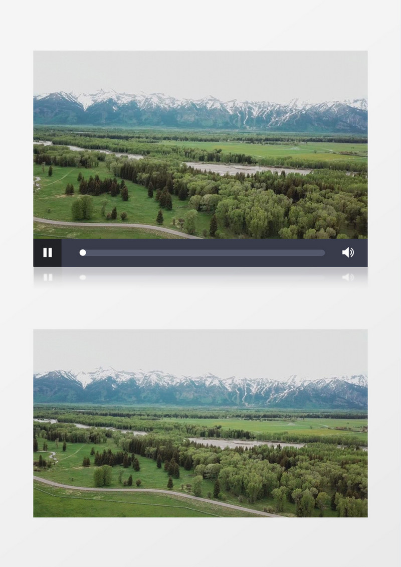 航拍雪山旁的森林及田地实拍视频素材