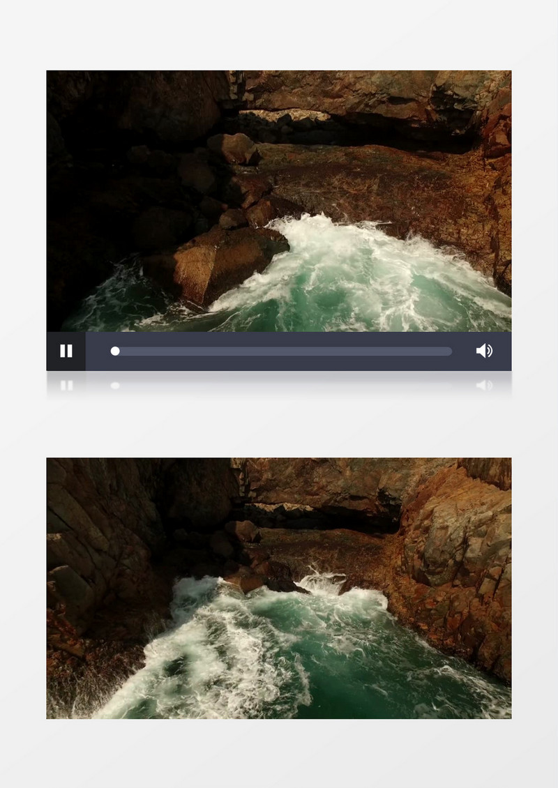 由近到远航拍汹涌的海浪不断拍打岸边的礁石壮阔的海面实拍视频素材
