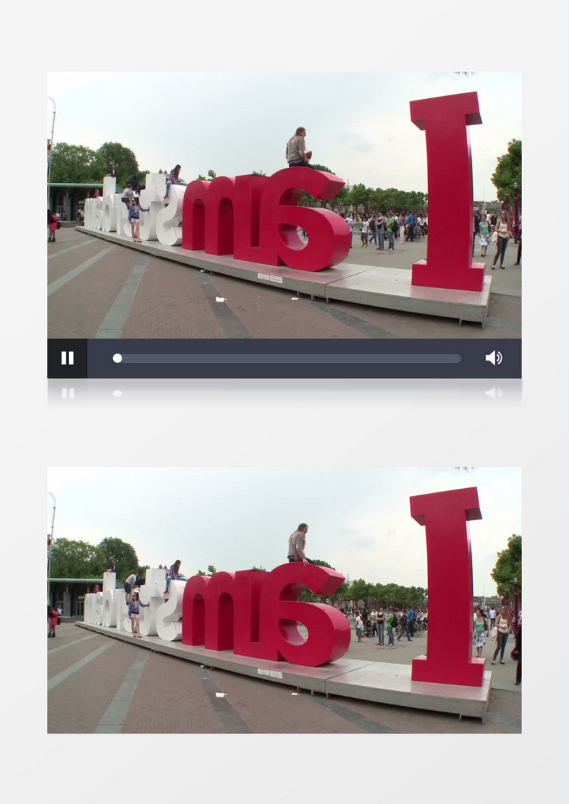 高清实拍游客们攀爬字母建筑留影实拍视频素材