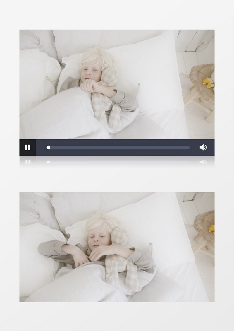 白发男孩躺在床上抱着玩偶睡觉实拍视频素材