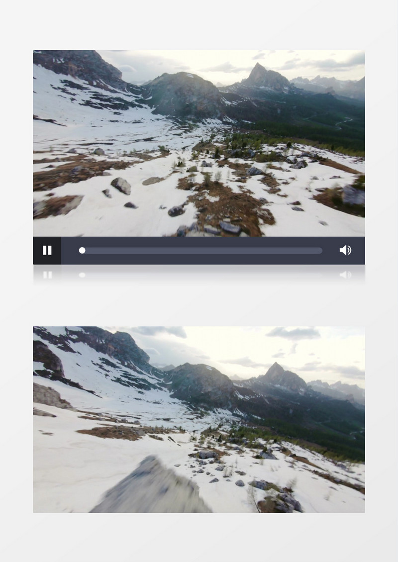 航拍高山下的雪地实拍视频素材