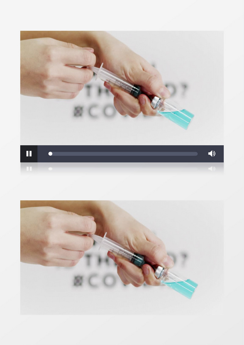 注射器抽取药瓶中蓝色的药水实拍视频素材