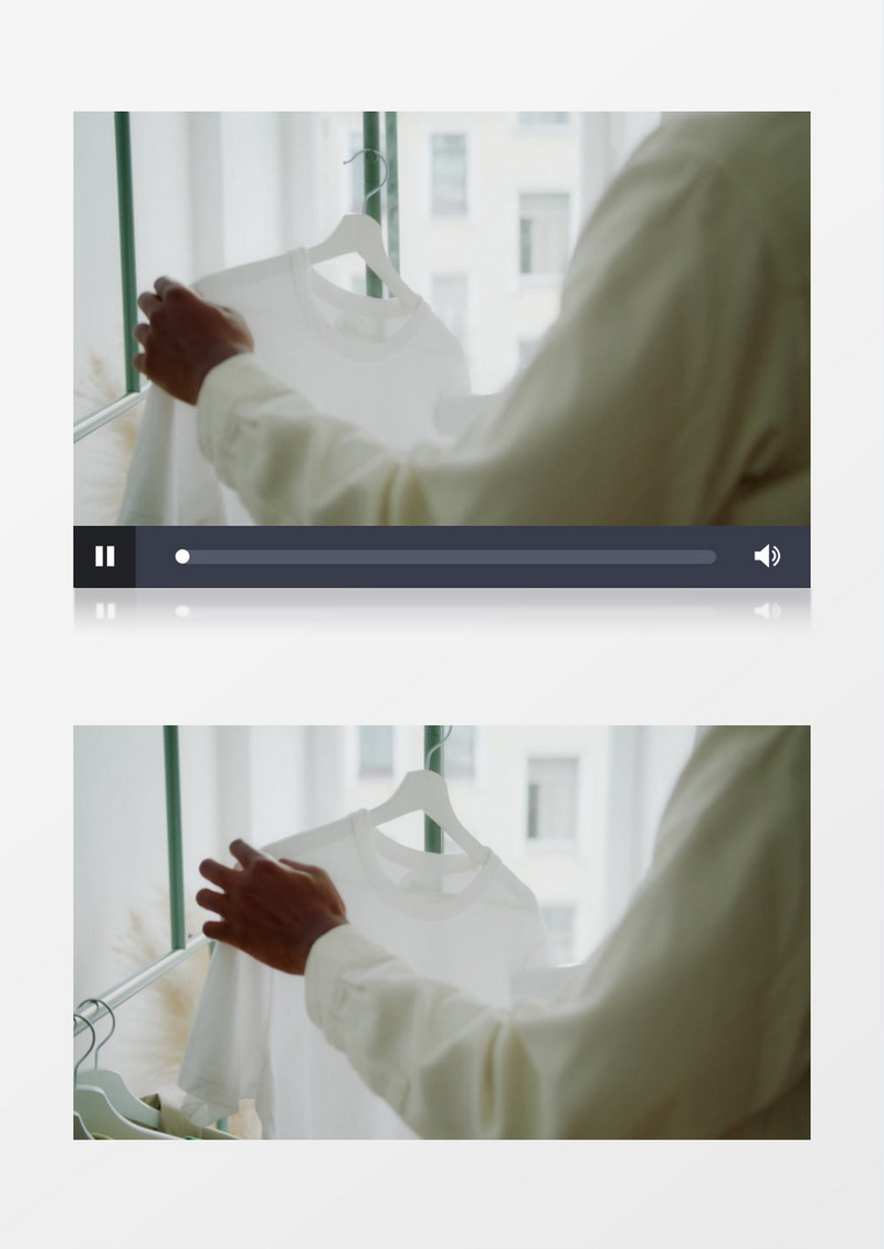 人在挂烫衣服实拍视频素材