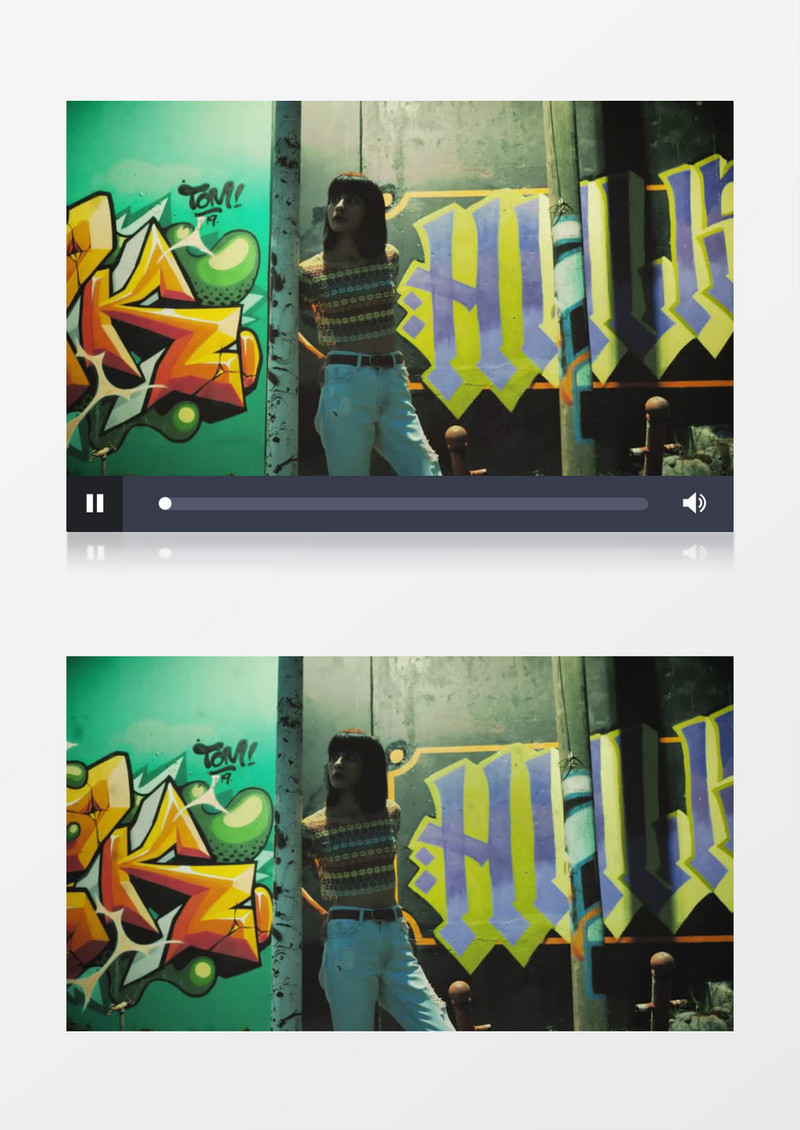 站在涂鸦墙旁边的短发女孩实拍视频素材