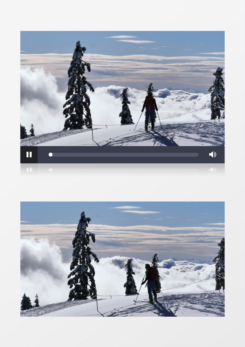 滑雪者在白雪皑皑的山顶边缘行走实拍视频素材