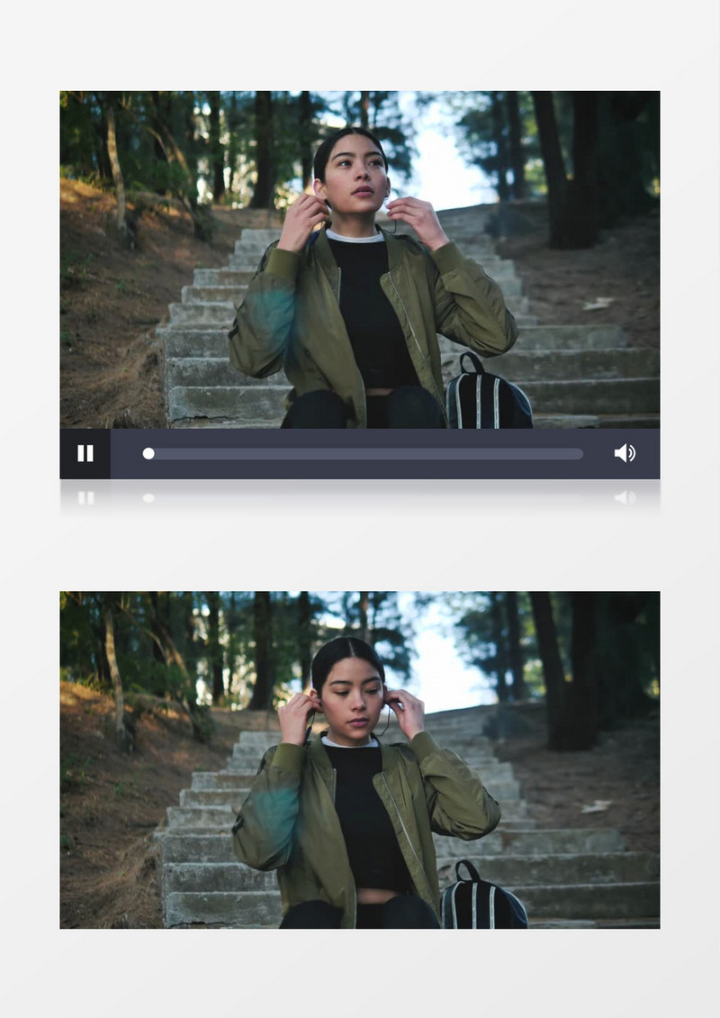 近景拍摄穿着运动服的女人戴上耳机听音乐实拍视频素材