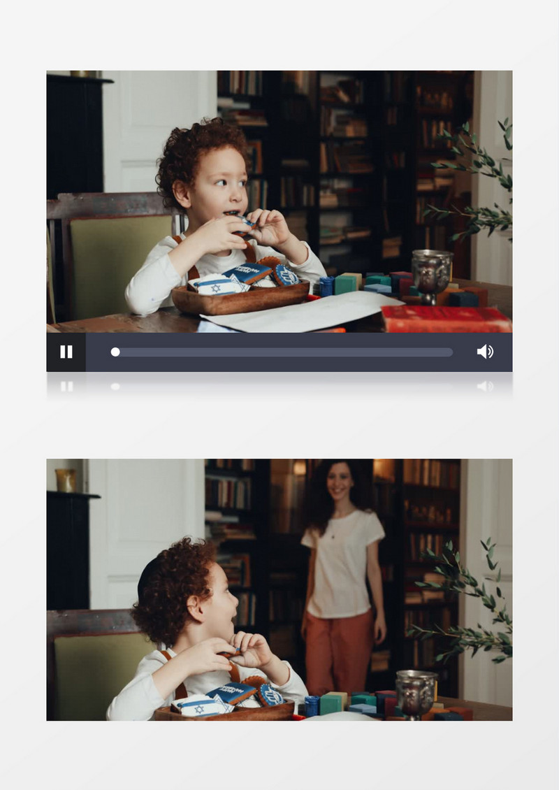 妈妈在看着宝宝吃饼干实拍视频素材