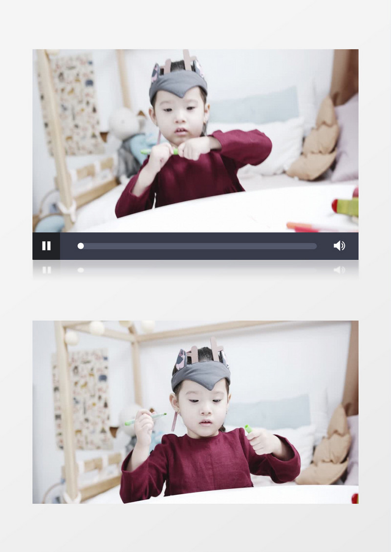 小女孩在拿绿色彩笔画画实拍视频素材