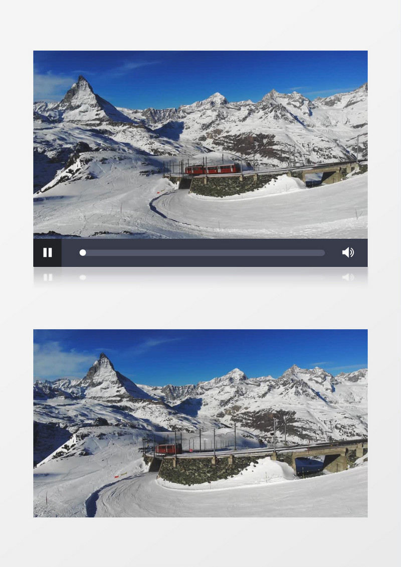 火车缓缓经过雪山实拍视频素材