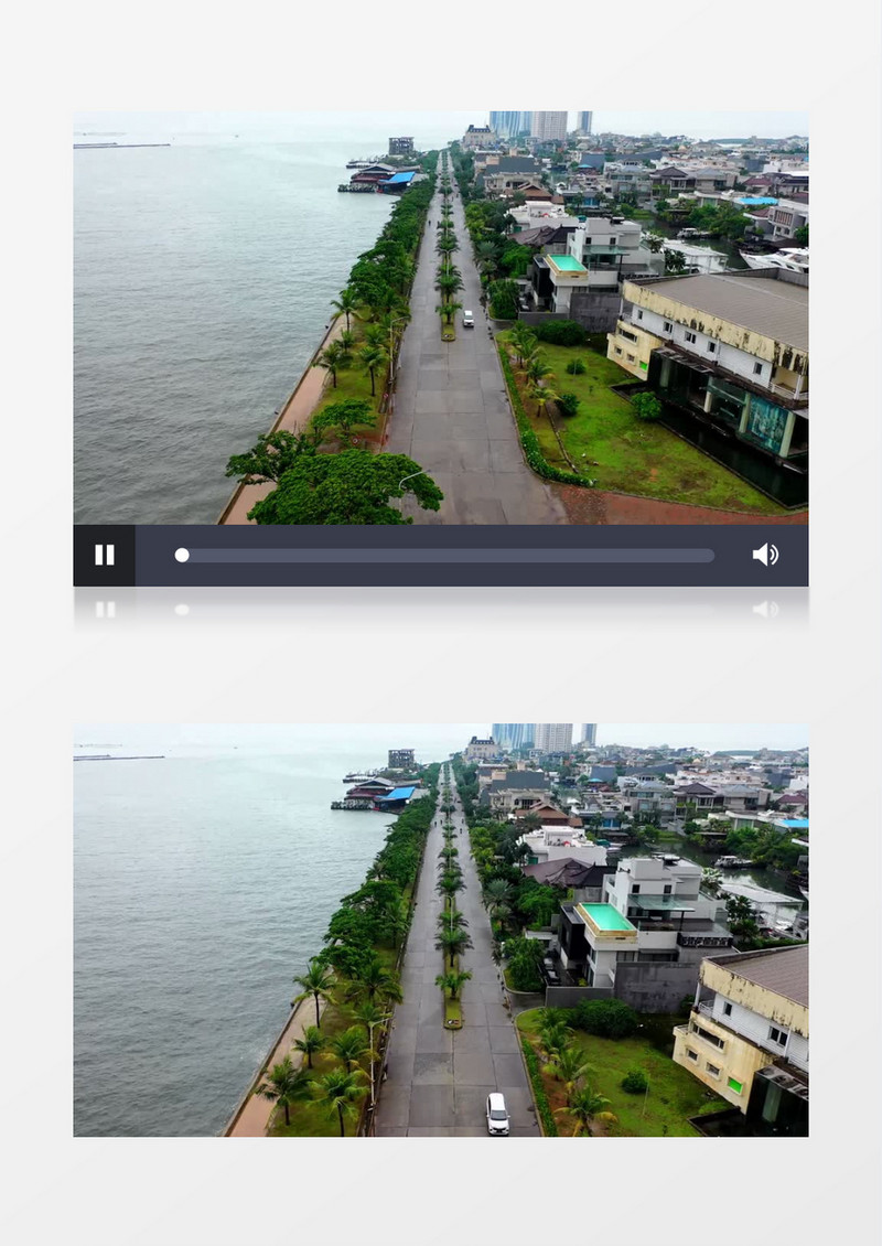 俯拍湖边街道的车辆行人实拍视频素材