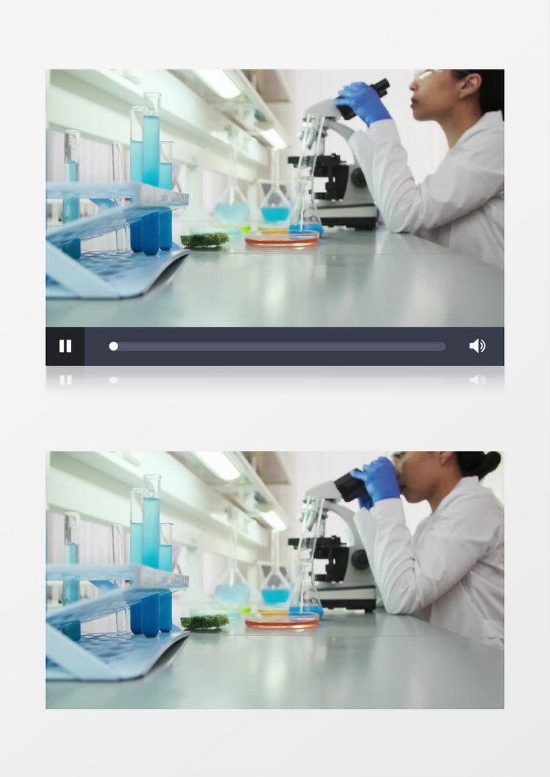 医护人员在实验室用显微镜观察样本实拍视频素材