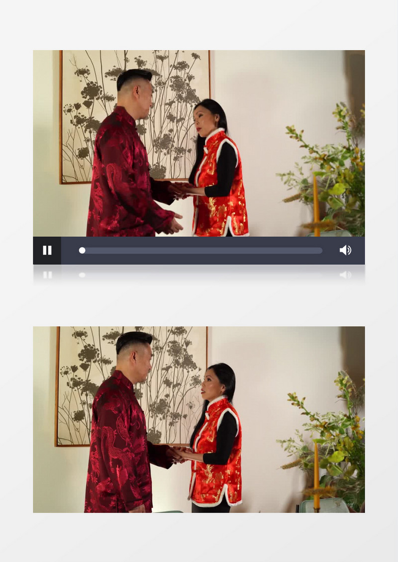 夫妻二人穿着喜庆在愉快的交流实拍视频素材