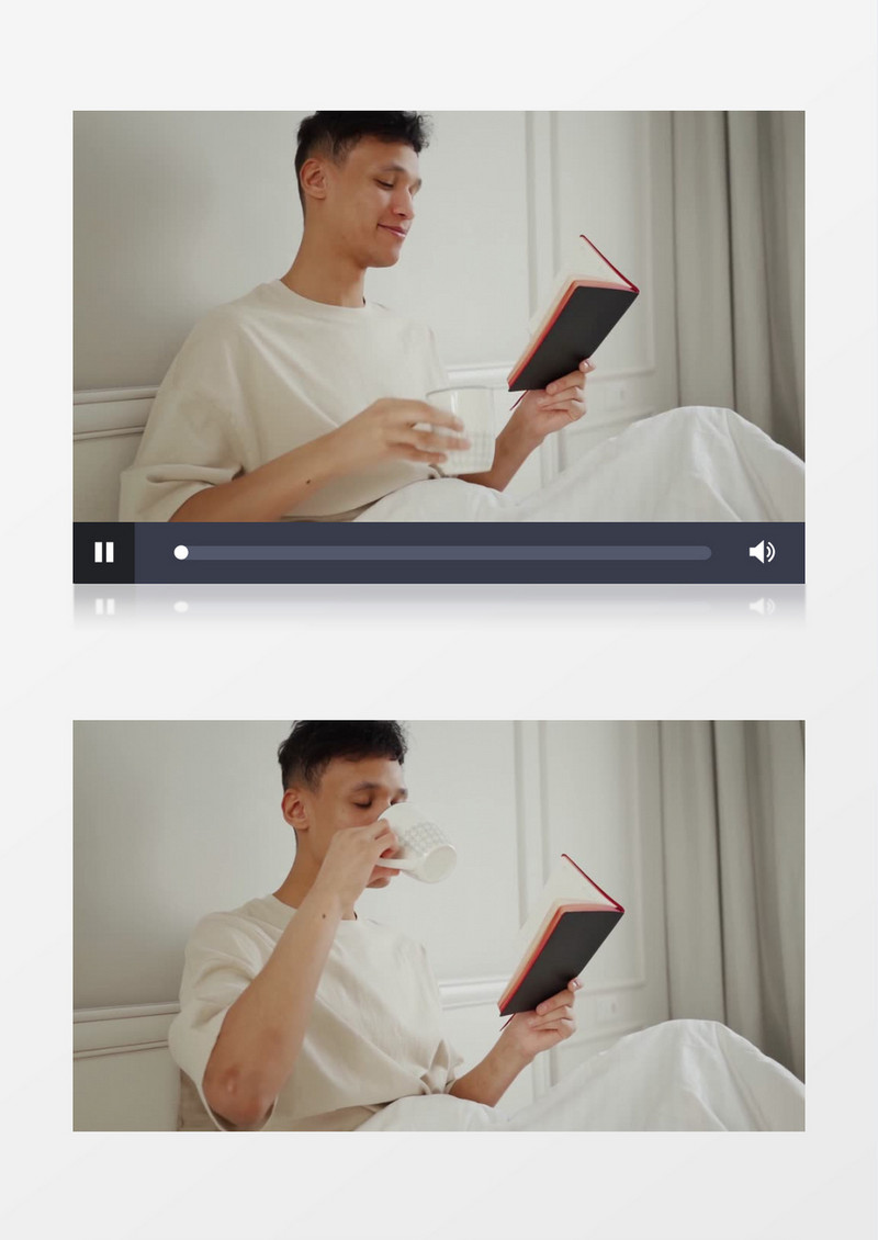 男人边喝水边看自己的笔记本实拍视频素材