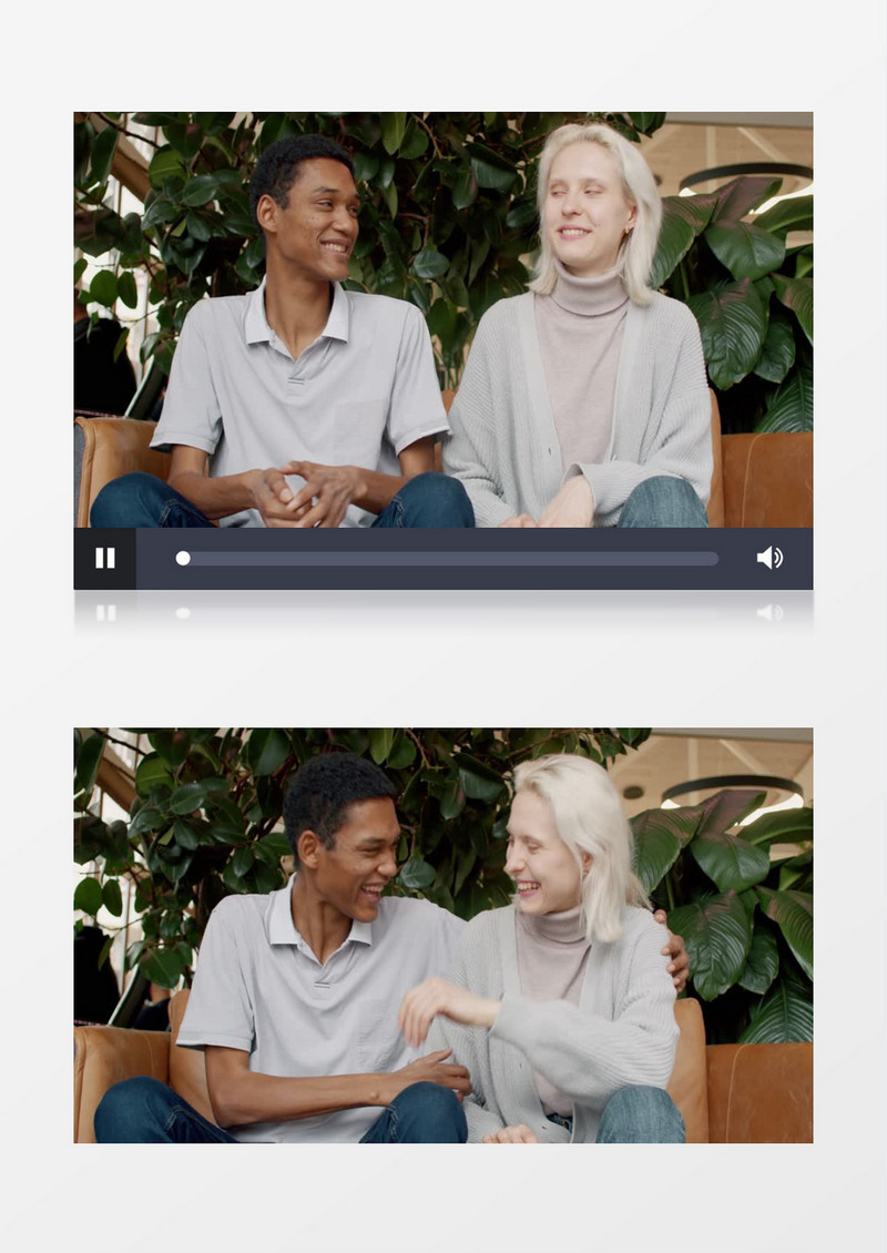 一男一女坐在沙发上开怀大笑实拍视频