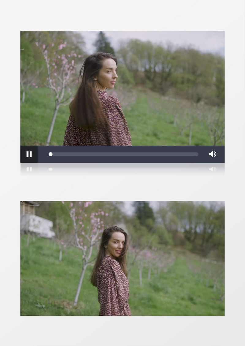 女子在桃花林里微笑回头实拍视频