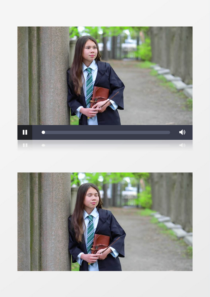女孩拿着书本倚靠在墙上实拍视频素材