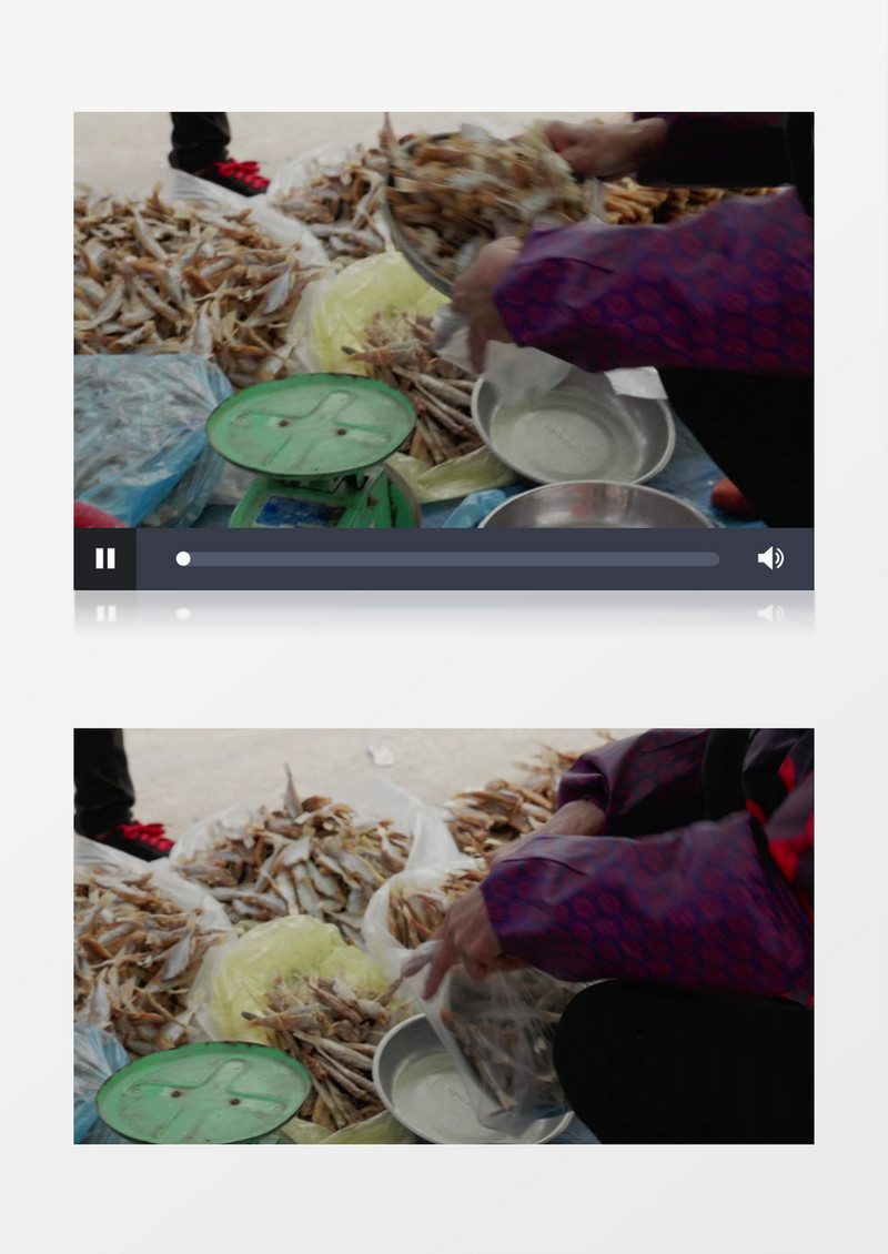 售货员在给鱼干打包装袋实拍视频素材
