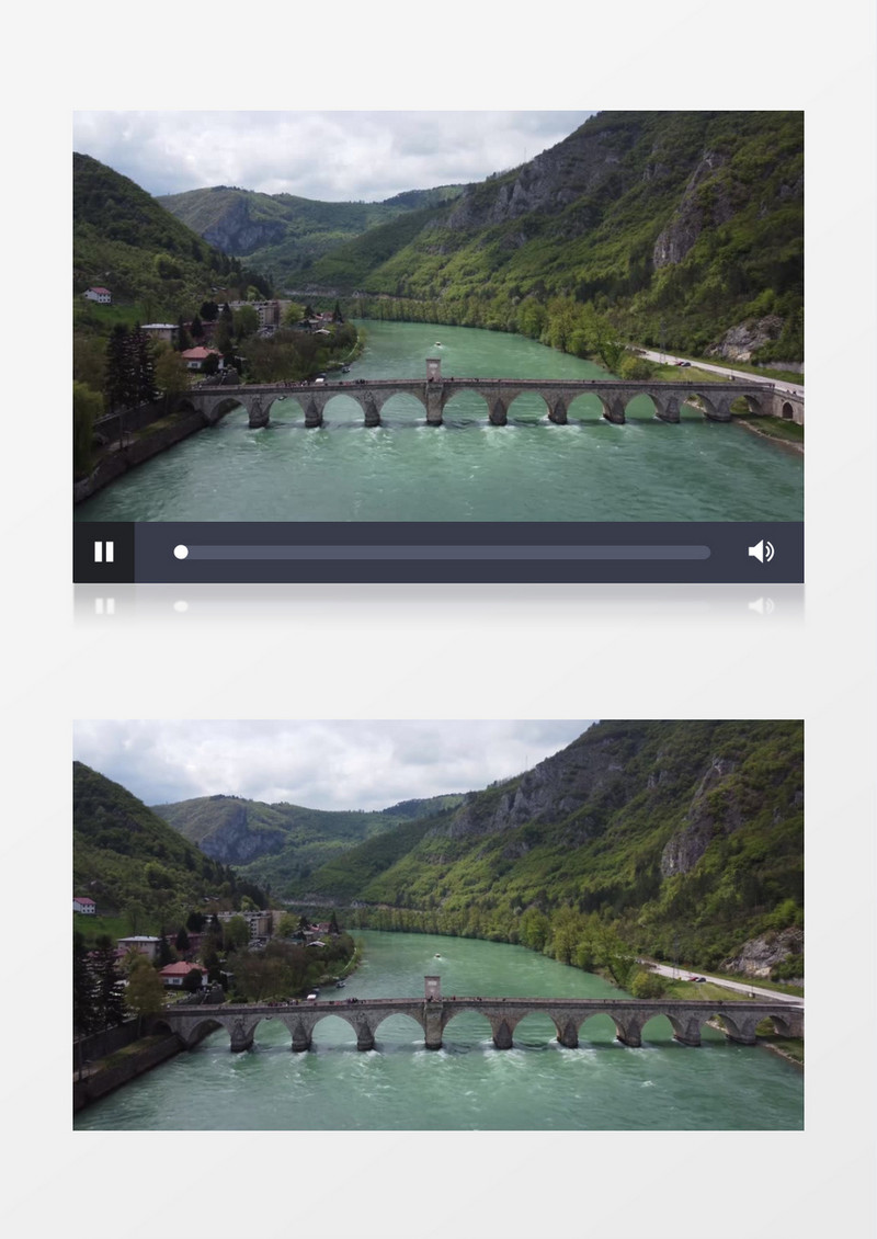 山脚下横跨河水的桥梁和周边景色实拍视频素材