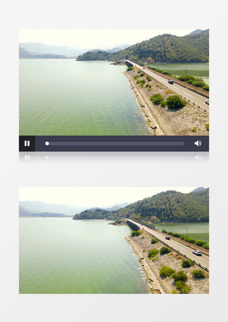 在山脚下的公路上不断行驶着汽车实拍视频素材